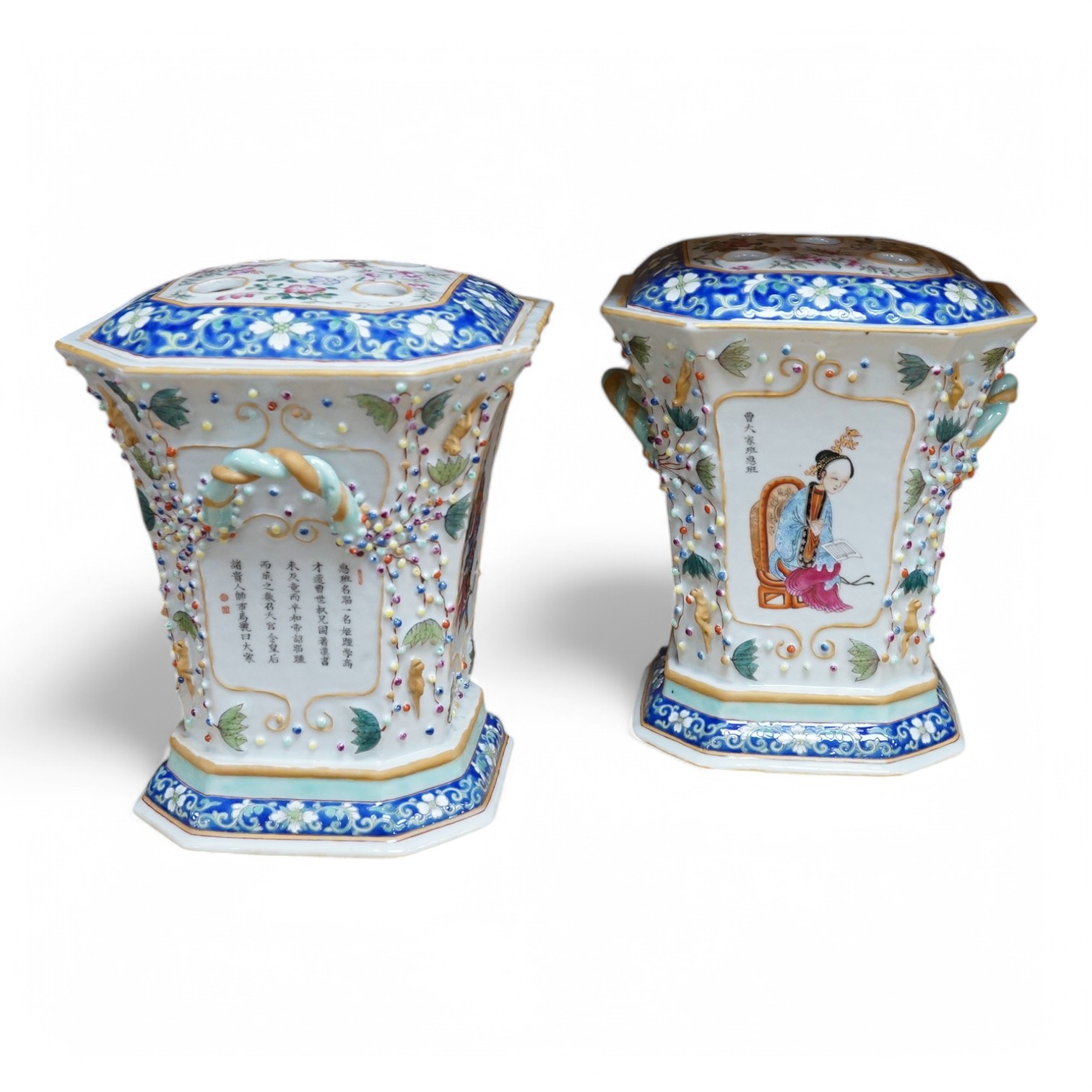 A pair of Chinese famille rose bough pots, painted with figures and calligraphy, 24cm high. Condition - one cover damaged